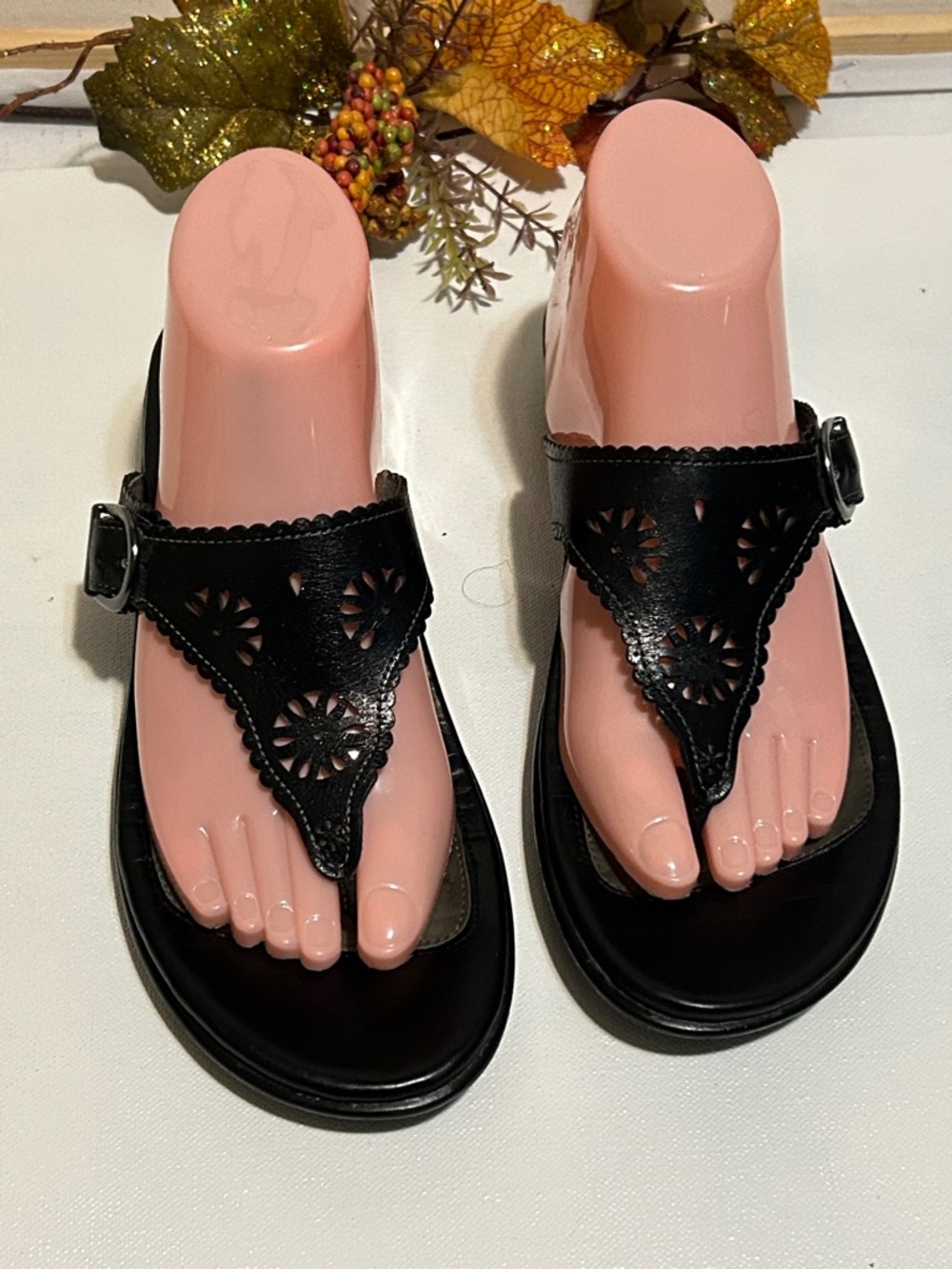 Dansko Black Laser-Cut Thong Sandals with Buckle Detail